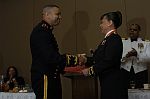 Major Everly receiving his MOVSM from LtCol Johnson